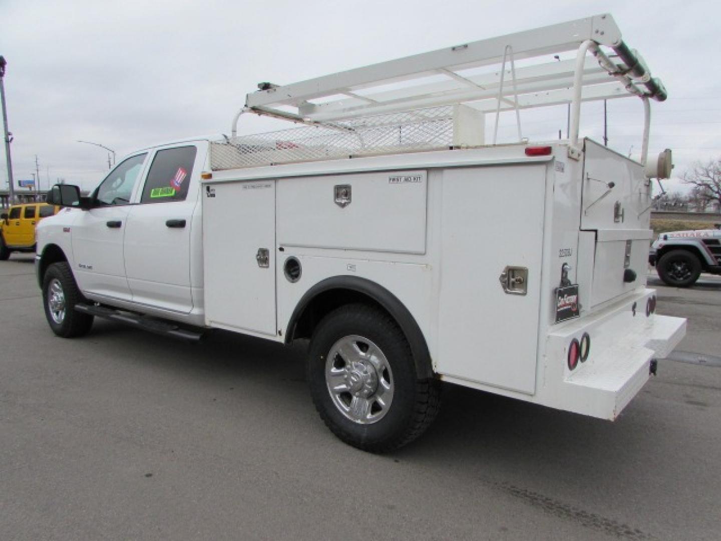 2020 White /Gray RAM 3500 Tradesman Crew Cab 4WD (3C63R3GJ0LG) with an 6.4L V8 OHV 16V engine, 8 speed automatic transmission, located at 4562 State Avenue, Billings, MT, 59101, (406) 896-9833, 45.769516, -108.526772 - 2020 RAM 3500 Tradesman Crew Cab 4WD Service Body - One owner! 6.4L Heavy Duty Hemi V8 Engine - 8 speed 8HP75-LCV Automatic Transmission - 4WD - Steel Service Body - Wyoming one owner - 72,697 miles - Inspected and serviced - Ready to head to the jobsite today! Tradesman level 2 equipment grou - Photo#1